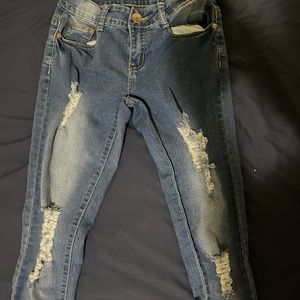 Fashion Nova Jeans. Medium denim. Size 1/2. New.